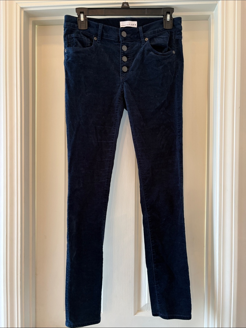 LOFT woman’s Navy Velvet Skinny pants Size 26/2 Navy Blue Button Fly
